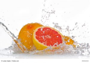 Grapefruit with splashing water