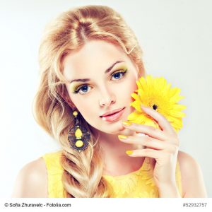 Beautiful model with yellow makeup.